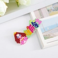 Cartoon girl hair clip with Happy Birthday text in vibrant colors for girls - Happy Birthday