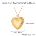 Golden heart locket necklace with floral relief design and size specifications - Alloy / Embossed Carved Heart / Gold