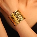 Wide gold plated leaf patterned open cuff bracelet with textured hammered finish - Irregular Hammered