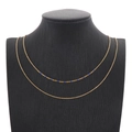 Double-layered gold titanium steel necklace featuring blue beads on O-chain strand - Blue