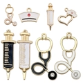 Detail of medical charms including alloy syringes, stethoscopes and nurse hats with enamel - KC Gold Medical Set Mix 8pcs