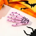 Pink skeleton hand hair clip with black joint details for Halloween hair accessory styling - Girl Pink