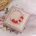 Bracciale di Natale con perline rosse e ciondolo asino in una confezione regalo beige - Stile Teschio Asino(3#)