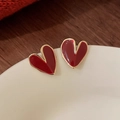 Elegant burgundy heart stud earrings with gold trim on white ceramic dish - 1 Silver Needle - Red Heart