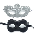 Detail of silver lace and black plastic masquerade masks with intricate cutout patterns - 018 Silver Lace + Eye Mask