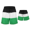 Matching father and son swim trunks in black, white, and green color block design - Black White Green / 104