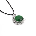 Detail of green oval crystal stone pendant with rhinestone border on black cord - Green/Black Rope