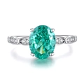 Elegant S925 silver ring featuring oval mint green gemstone and micro-pave diamond band - US 6 / Paraiba Blue