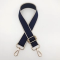 Close-up of 3.8cm navy and cream woven strap with adjustable golden lobster clasps - Blue with Beige Edge / Gold Hook