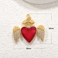 Detailed view of red heart pendant with gold crown and wings with dimensions 26x28mm - Crown Wings Heart