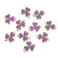 Dettaglio di dieci ciondoli a trifoglio viola in lega per la creazione di gioielli - Viola