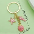 Schlüsselanhänger mit rosa Seestern Seepferdchen und Muschel in Gold für Damentaschen - LS164 Rosa Seepferdchen Muschel