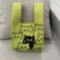 Green knit tote bag featuring pixelated black cat patterns and integrated handle - Green Cat Pattern