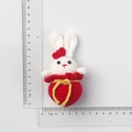 Handmade crochet bunny doll with red ribbon bow and pouch, height approximately 7.5cm - Fortune Bag Rabbit Doll
