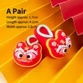 Pair of red lion dance cake toppers for baby 1st birthday or 100-day celebration - Soft Glue Red Tiger Shoes (Pair)