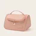 Rose pink woven texture makeup bag with double zippers and top handle for travel - Curved Bag / Rose Pink