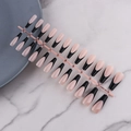 Macro shot of 24pcs nude and black French tip oval press-on nails on a pink holder - French Black Tip Long Almond Glossy (XFS-MP15)