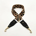 Detail of leopard print bag strap with golden buckles and leather stitch finishing - Khaki + Black Leather
