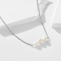 Elegant 925 sterling silver necklace with three natural freshwater pearls on white stones - 925 Silver / White