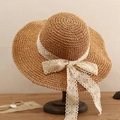 Handwoven straw sun hat for women featuring a wide brim and elegant cream lace bow detail - L (58-60cm) / Wide Brim Lace Bow Khaki
