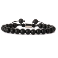 Close-up of black matte lava stone beads and stainless steel magnetic clasp with woven cord - 8MM Matte Black Agate