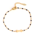 Gold stainless steel chain bracelet with black beads and a unique bone charm pendant - Gold Bone - Black Beads