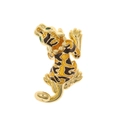 Detailed view of a golden enamel tiger pendant with green gemstone eyes and stripes - Enamel Gold Leopard