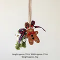 Gingerbread man resin Christmas decoration with pine cones and red bow tie ornament - Red Bow Gingerbread C (41g)