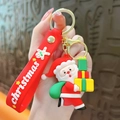 Cute Santa Claus keychain with red wrist strap and colorful gift boxes Christmas gift - Santa With Three Gifts