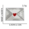Detail showing embroidered heart envelope patch with precise dimensions 6.9cm by 4.8cm - Red Heart Envelope