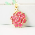 Pink rhinestone rose keychain with gold metal frame and enamel finish on white box - Pink