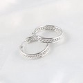Silver stainless steel twisted rope hoop earrings with elegant woven design for women - Silver