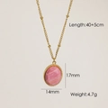 Collar vintage de acero inoxidable chapado en oro de 14K con dije de rodocrosita - Piedra Rosa Ovalada con Borde de Cuentas