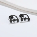 Detail view of black stainless steel stud earrings featuring headphone and heartbeat design - Headphone / Black