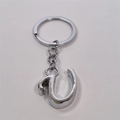 Minimalist silver metal keychain with uppercase letter U pendant and polished ring - Letter U / Silver