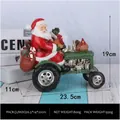 Resin Santa Claus driving a green tractor statue with gifts and rooster figurines - Tractor Santa