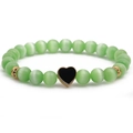 Green cat eye stone beaded bracelet featuring a black heart charm with gold accents - Green With Black