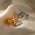 Detail of gold and silver multi-layer snake rings with starfish and shell accents - JZ7147 Ocean Starfish Shell / Gold