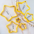 Set of 6 yellow star-shaped plastic cookie cutters in varying sizes from 2.9cm to 11cm - Yellow Star Shape Cutter Set 6-Piece