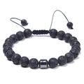 Close-up of volcanic lava stone beads and hexagonal metal hematite on adjustable cord - Lava Rock Bracelet