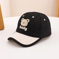 Close-up of kids baseball cap featuring 3D teddy bear embroidery and contrast brim - Black and Beige