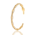 Detailed close-up of a gold-plated open bangle with white enamel and sparkling rhinestones - White Enamel (S84-4)