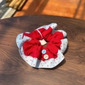 Red scrunchie with blue polka dot trim and vintage buttons on a wood surface - Blue Red Polka Dot Scrunchie with Buttons