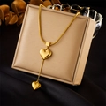 Chic heart pendant tassel chain necklace in gold finish on silk background - Gold Style (N2702)