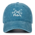 Detailed front view of washed denim baseball cap featuring white Cat Mom embroidery - One Size / Lake Blue