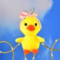 Close-up of a cute plush yellow duck with a pink floral headband bow - Pink Headband Style (Duck) / 12cm