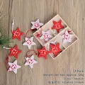 Set of 12 red and white wooden star Christmas ornaments with reindeer and forest patterns - Style E