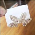 Golden butterfly earrings with purple crystals and white diamonds on display card - 14K Gold Purple Zirconia