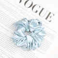 Light blue satin scrunchie with elegant pleats and glossy finish for women's hair - Light Blue
