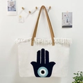 Canvas-Einkaufstasche mit Hamsa-Hand-Stickerei, blauem Auge und Fransenbesatz - Hamsa Hand Muster